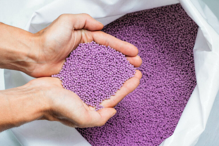 Hands hold or touching biodegradable plastic pelle 2023 04 20 20 13 11 utc